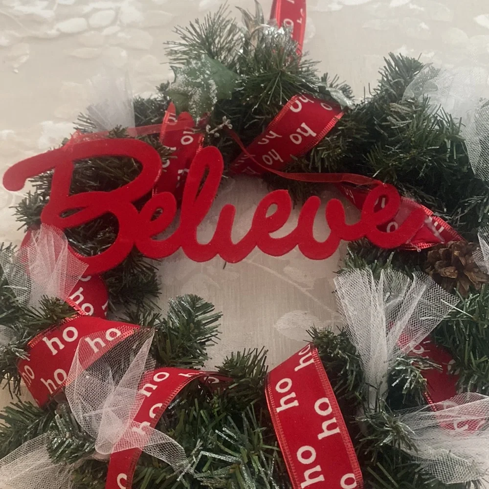 Winter holiday wreath with ho ho ho & BELIEVE adornments evergreen base
